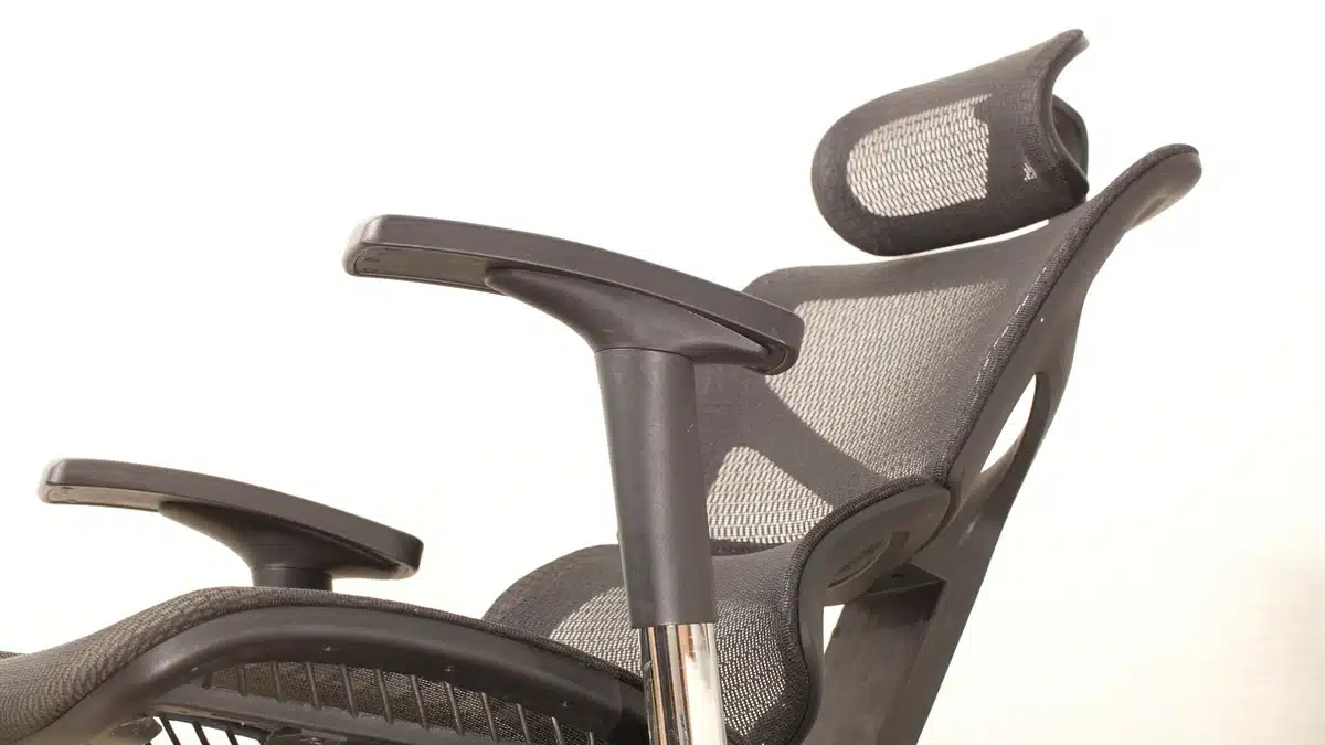 Ergonomic mesh office chair Malaysia with a high-back design and headrest for breathable comfort.